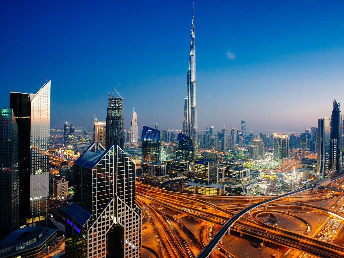 GettyImages-469692894_Dubai-skyline-traffic-junction-Burj-Khalifa_2400x1600.jpg